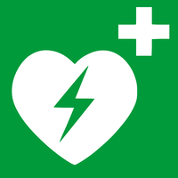 Defibrillator-Icon: weisses Herzsymbol mit Blitz auf grünem Grund